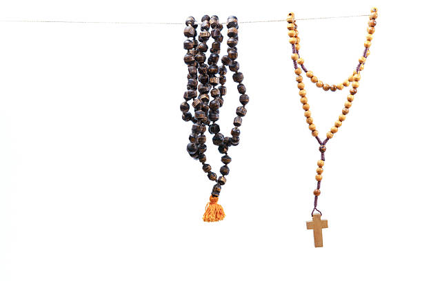 istock Wooden rosary beads and prayer mala hanging 2238464730