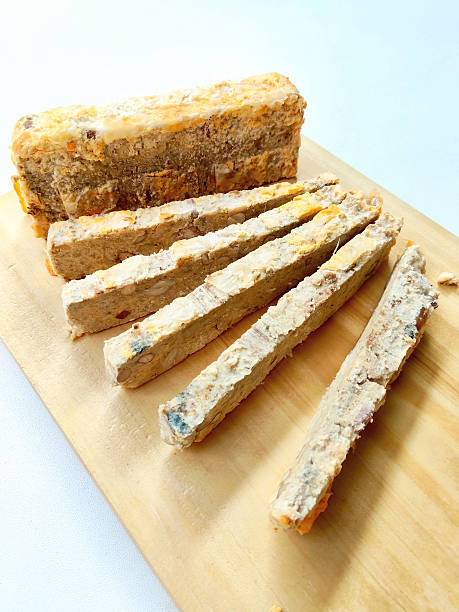 istock Crispy Fried Oncom Sticks, Traditional Indonesian Fermented Food Snack on Rustic Wooden Board 2238466385