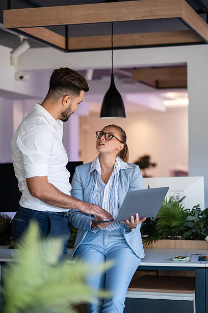 istock Business professionals discussing strategy during office meeting 2238471802