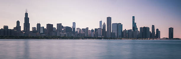 istock Sun setting on the skyline, Chicago, IL, USA 2238473311