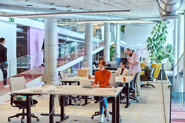 istock In a modern startup office, a diverse group of young professionals collaboratively tackles various business problems and challenges, surrounded by their engaged colleagues, fostering innovation and productivity 2238473539