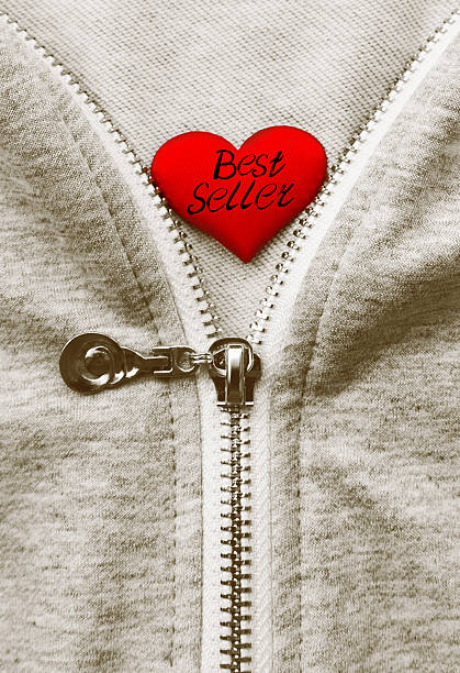 Best Seller. Handwriting text on red heart.