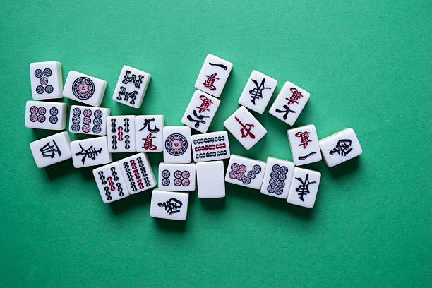 istock Mahjong tiles lined up on a green background 2238485750