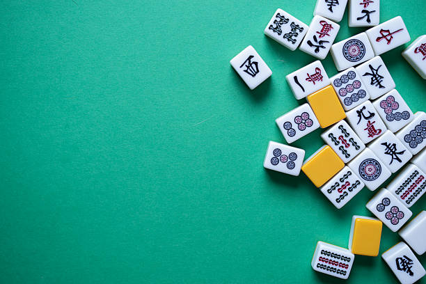 istock Mahjong tiles lined up on a green background 2238485767
