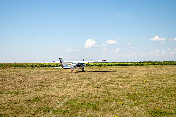 Homemade radio control toy aircraft with motor parked on a grassy field