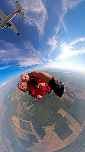 istock Tandem skydivers capture a thrilling aerial selfie during a freefall adventure. 2238486802