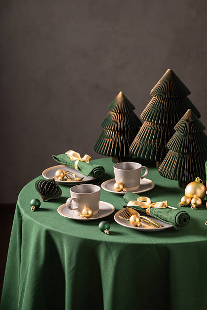 istock Lovely green table set for Christmas with green decorations. 2238486805
