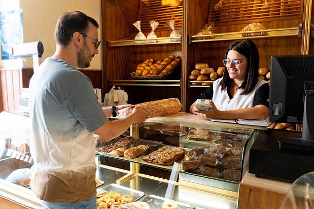istock Customer buying bread at a traditional bakery 2238486882