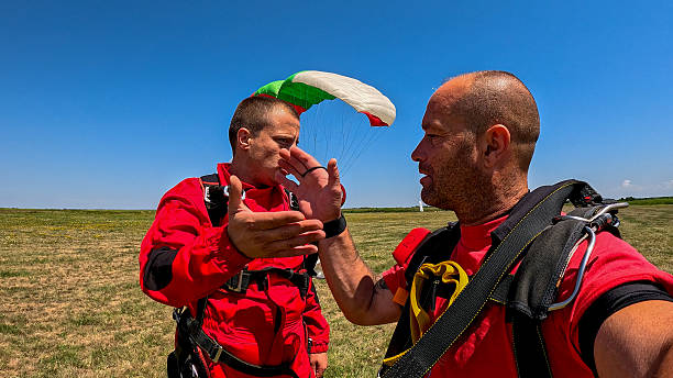 istock Tandem skydivers share a high-five during freefall, capturing adrenaline and teamwork in the open sky 2238487232