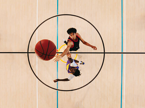 istock Basketball players competing for the ball 2238487258