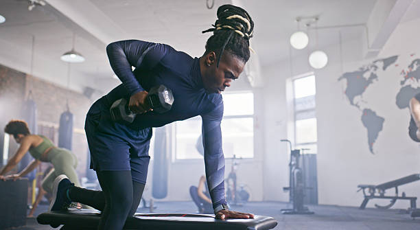 istock Focused Workout Session at a Modern Gym With Dedicated Exercise Enthusiasts 2238487379
