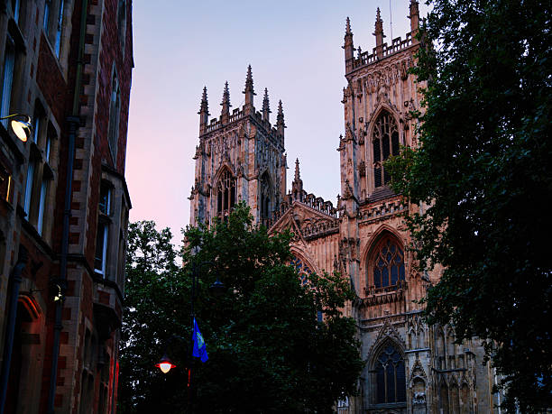 Majestic York Minster Gothic Cathedral towers, landmark architecture in England, rising above York's historic district