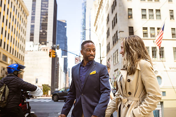 istock Stylish Couple Walking in City 2238491005