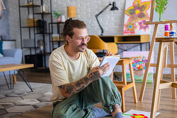 istock Artist sketching ideas for a new painting at home studio 2238493613