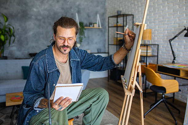 istock Artist sketching ideas for a new painting at home studio 2238496623