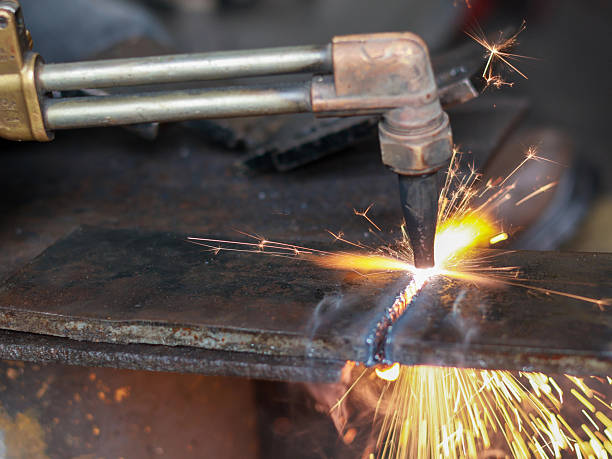 istock A torch acetylene gas cutting metal with bright sparks flying and splash 2238496865