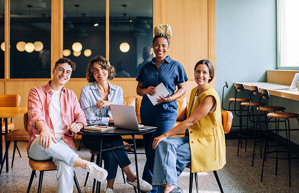 istock Diverse team of young professionals meeting at a modern workspace 2238497275