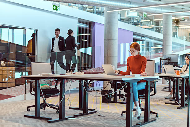 istock In a modern startup office, a diverse group of young professionals collaboratively tackles various business problems and challenges, surrounded by their engaged colleagues, fostering innovation and productivity 2238500359