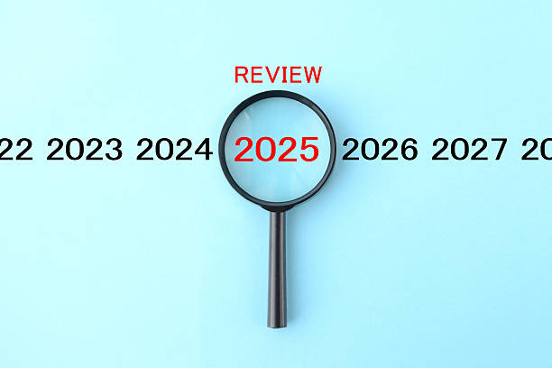 istock Image concept, looking back at 2025 through a magnifying glass 2238504545