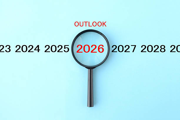 istock Image concept, the analysis of future prospects for 2026 using a magnifying glass. 2238504575