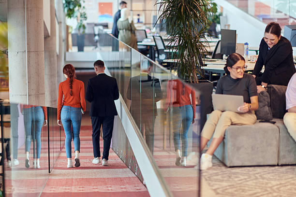 istock In a modern startup office, a diverse group of young professionals collaboratively tackles various business problems and challenges, surrounded by their engaged colleagues, fostering innovation and productivity 2238507815