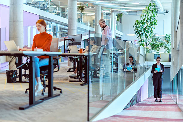 istock In a modern startup office, a diverse group of young professionals collaboratively tackles various business problems and challenges, surrounded by their engaged colleagues, fostering innovation and productivity 2238508332