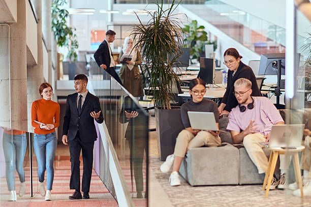 istock In a modern startup office, a diverse group of young professionals collaboratively tackles various business problems and challenges, surrounded by their engaged colleagues, fostering innovation and productivity 2238508589