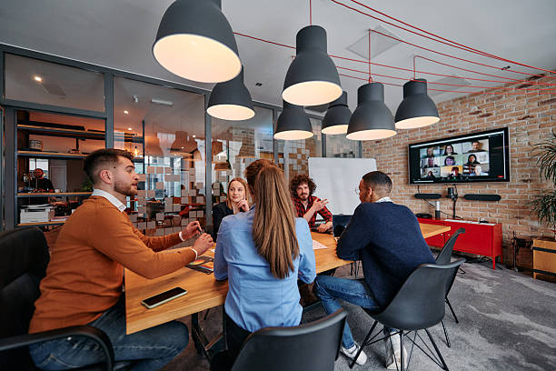 istock A diverse team of business professionals engage in discussions on various projects and develop new business strategies, epitomizing creativity and innovation in the entrepreneurial landscape 2238509219