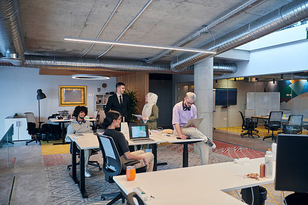 istock In a modern startup office, a diverse group of young professionals collaboratively tackles various business problems and challenges, surrounded by their engaged colleagues, fostering innovation and productivity 2238510700