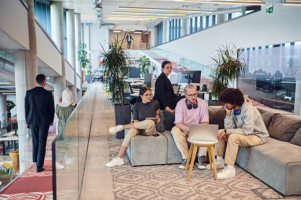 istock In a modern startup office, a diverse group of young professionals collaboratively tackles various business problems and challenges, surrounded by their engaged colleagues, fostering innovation and productivity 2238510812