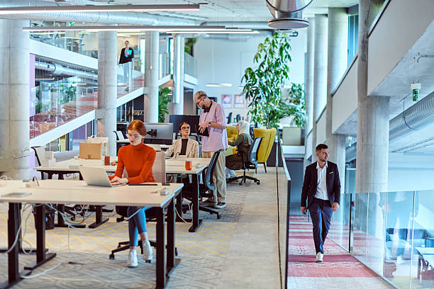 istock In a modern startup office, a diverse group of young professionals collaboratively tackles various business problems and challenges, surrounded by their engaged colleagues, fostering innovation and productivity 2238511313