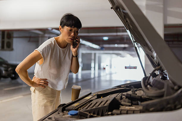 istock Japanese woman calling for help on cell phone 2238514667