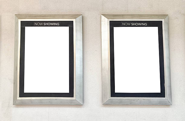 istock Two mock-up poster frames on a gray cinema wall 2238517368