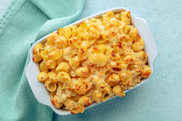 istock Mac and Cheese, macaroni pasta, oven-baked in a casserole with cream 2238526953