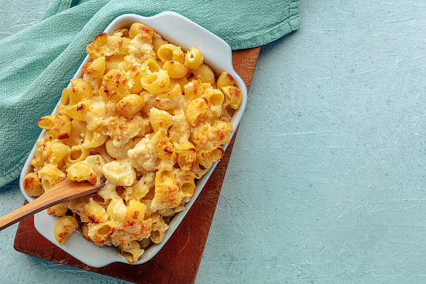 istock Mac and Cheese, macaroni pasta, oven-baked in a casserole with cream, 2238527534