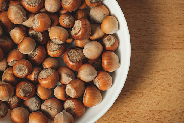 istock Harvesting nature's bounty with a collection of fresh hazelnuts 2238532261
