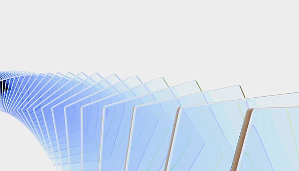 istock Series of translucent blue glass panels arranged in dynamic, spiraling pattern against white background creates sense of movement and modernity 2238533808