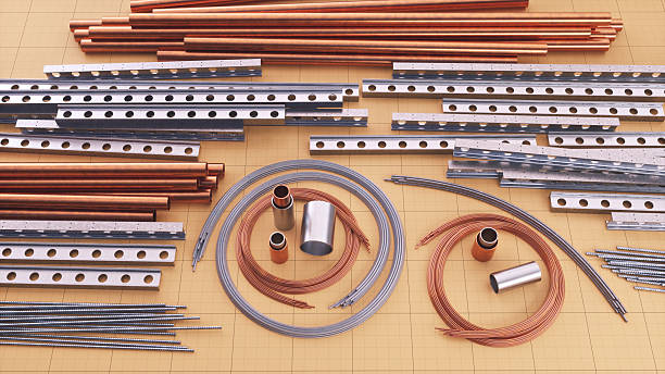 Arrangement of various metal construction elements, top-down shot.