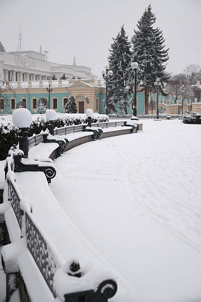 istock bench in the park in the snow 2238538260