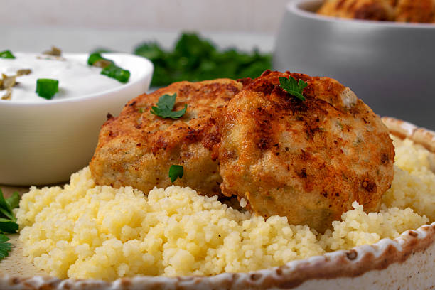 istock Haddock fish cakes made of mince served with couscous 2238543305