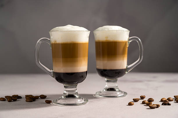 istock Layered coffee latte drinks. Hot coffee drinks in glass mugs 2238550654