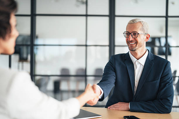 istock Successful business agreement sealed with a handshake in modern office 2238551866