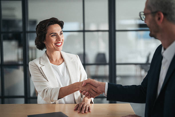 istock Successful business agreement sealed with a handshake in modern office 2238551869