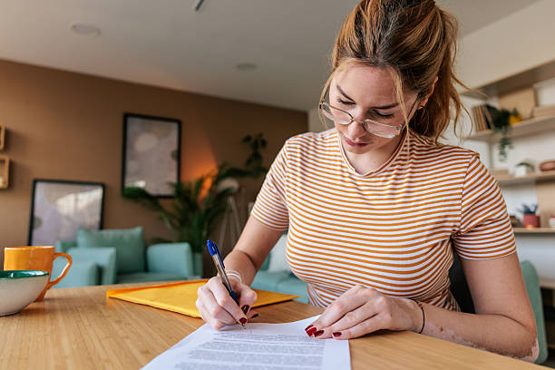 istock Woman Managing Household Expenses 2238552031