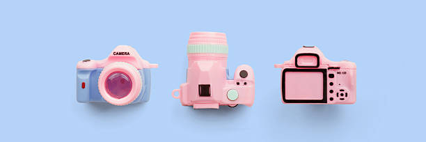 istock Colorful toy camera on pastel color background 2238553357