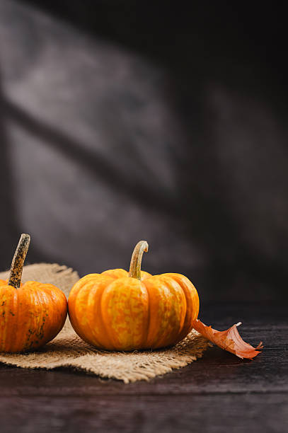 istock Group of orange pumpkins on bright background, abstract autumn, concept 2238553963