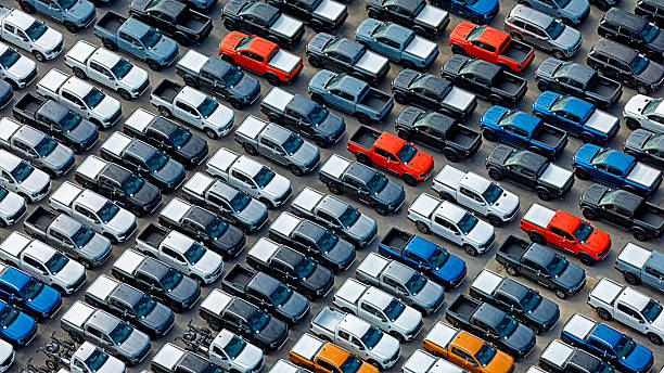 istock Aerial view new cars awaiting export. 2238553996