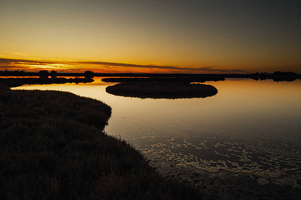 istock sunset over the lagoon, Po river delta, Comacchio, Ferrara, Italy 2238555327