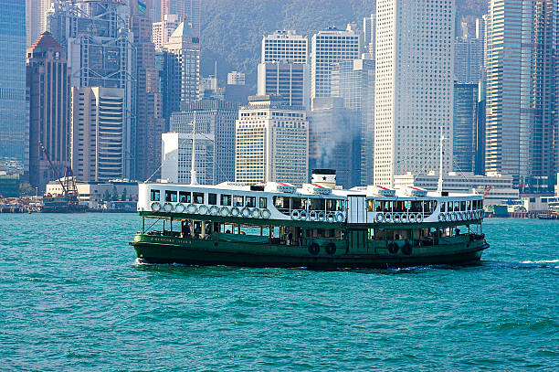 Hong Kong, China – 5 January 2007: The Star Ferry vessel “Meridian Star” sails across Victoria Harbour with the Central district skyscrapers in the background. The iconic ferry service has been a symbol of Hong Kong’s maritime heritage and daily commuter life for over a century.