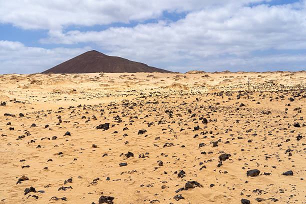 Fuerteventura western views from La Montaña Roja, clear day with wind. Montaña de Calderas blancas, Montaña del Mal Nombre and Montaña pajarita in the further part of the image